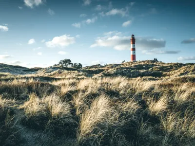 Dünenlandschaft mit Leuchtturm